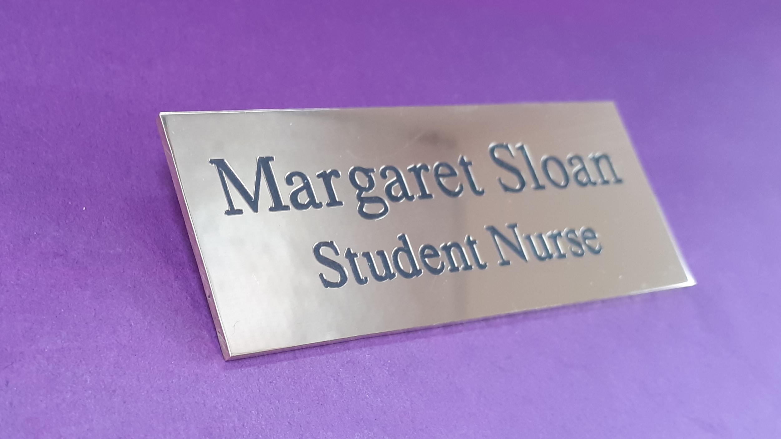 Rectangle brass name badge, with black engraving