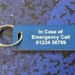 Vibrant blue emergency tag with essential medical information for swift and informed response.