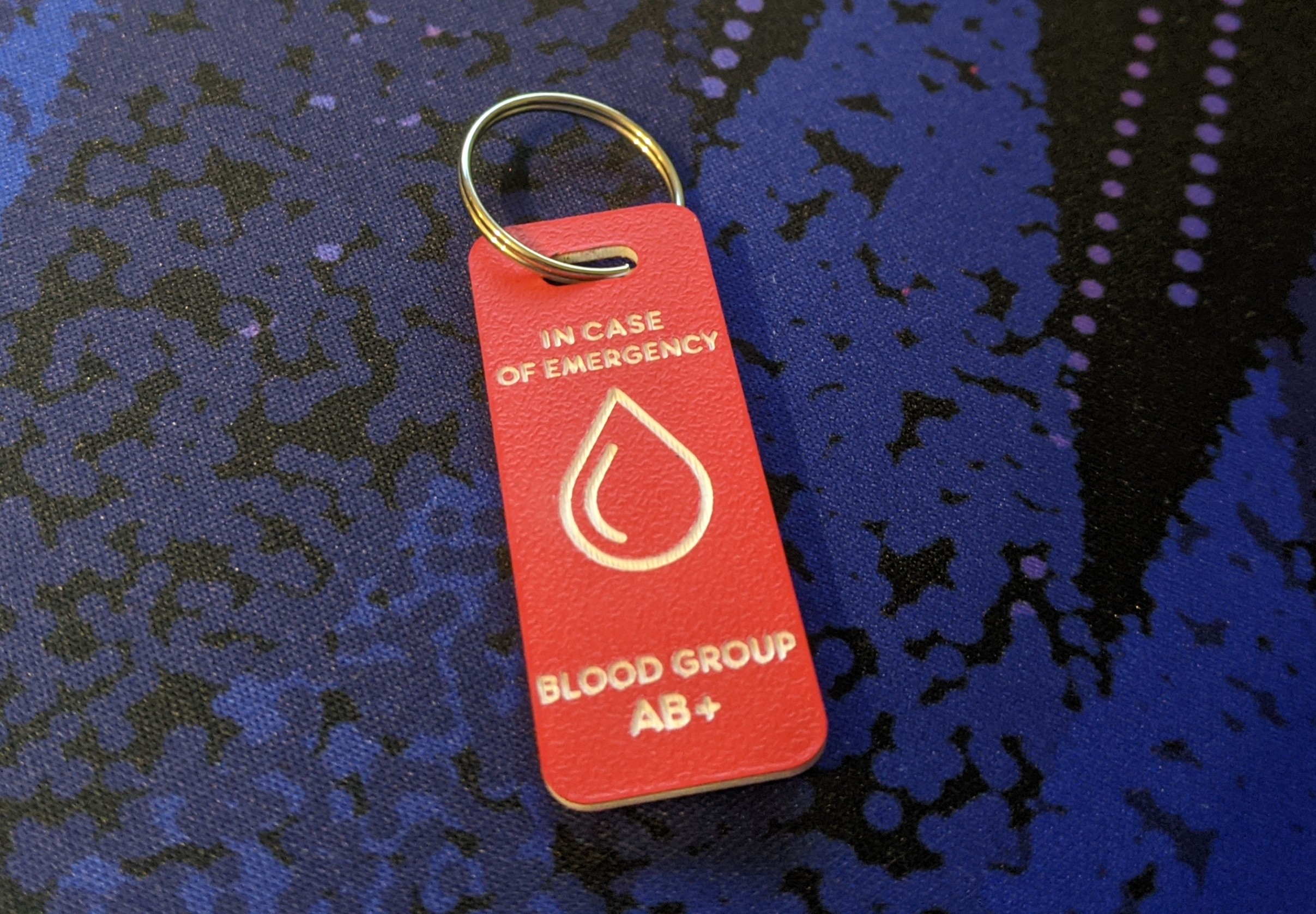 Red emergency tag, discreetly conveying critical medical information for effective emergency response
