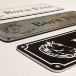 Close up Personalised Stable Name Plaques - 6" x 2" with decorative border, engraving of a Horse's Head on the Left-Hand side with contrasting name in the centre of the plaque, 4 screw holes in each corner.