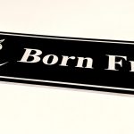 Close up of white Engraving on black Stable Name Plaque - 6" x 2" with Left-Hand Horse's Head Design