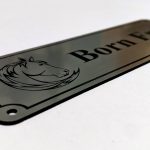 Close up of black Engraving on silver Stable Name Plaque - 6" x 2" with Left-Hand Horse's Head Design
