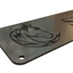 Close up of black engraving on silver Stable Name Plaque - 6" x 2" with Left-Hand Horse's Head Design