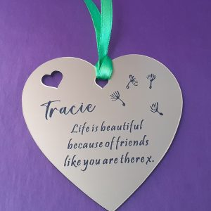 Charming heart-shaped acrylic plaque with your custom message for gift bags