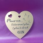 Custom-engraved heart-shaped acrylic plaque, perfect as a gift bag accessory