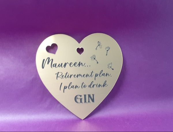 Custom-engraved heart-shaped acrylic plaque, perfect as a gift bag accessory