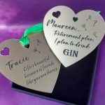 Heart-shaped acrylic plaque with custom engraving, designed as a special gift bag tag