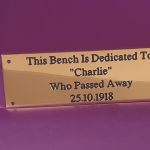 Classic brass bench plaque design, engraved with precision and enhanced by black paint infill, secured with four reliable screw holes
