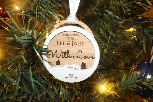 Handcrafted Wooden Christmas Tree Decorations with unique engravings and personalised touches