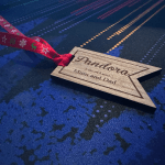 Sustainable and rustic Christmas gift tag made from cherry wood