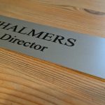 Make a statement with this sleek 10" x 2" aluminum office door sign, a perfect fit for any professional setting