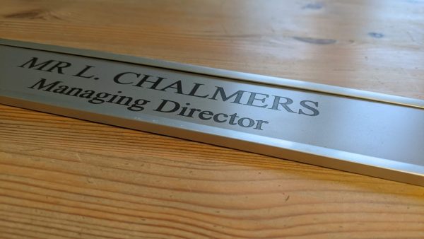 Impress visitors with a polished entrance - 10" x 2" aluminum office door sign in modern aluminum holder