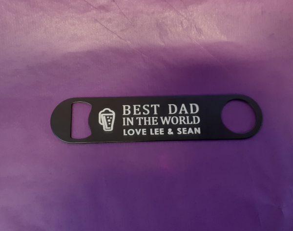 Stainless Steel Bar Blade Bottle Opener with laser engraved text, showing the title best dad and a person name
