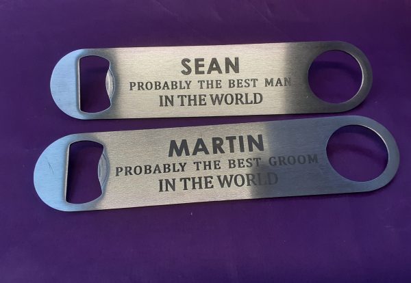 Two High-quality stainless steel bar blade bottle openers with a sleek design and custom engraving, ideal for various occasions.